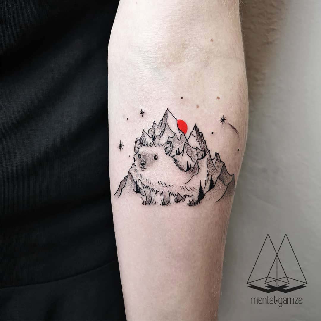 arm tattoo hedgehog mountains