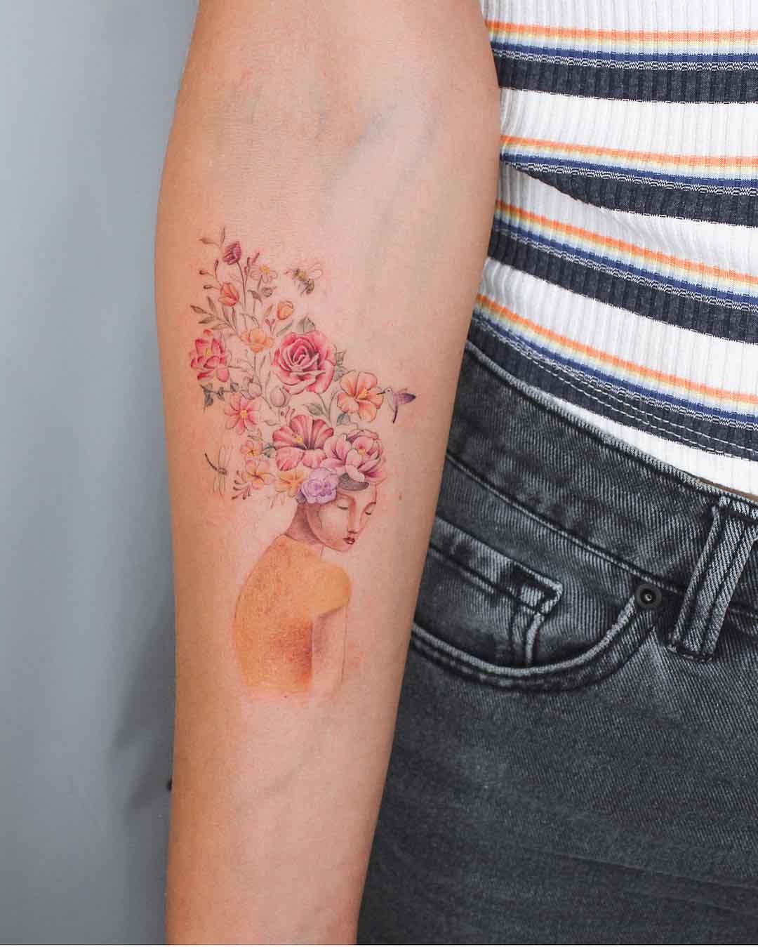 arm tattoo flowers girl