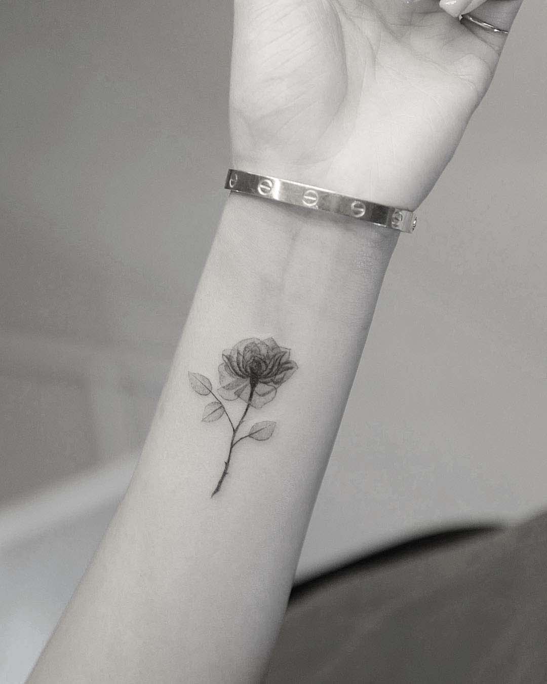 wrist flower tattoo rose